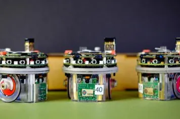 PUBLICATION SCIENTIFIQUE | ?? Neuro-évolution et robots en essaims